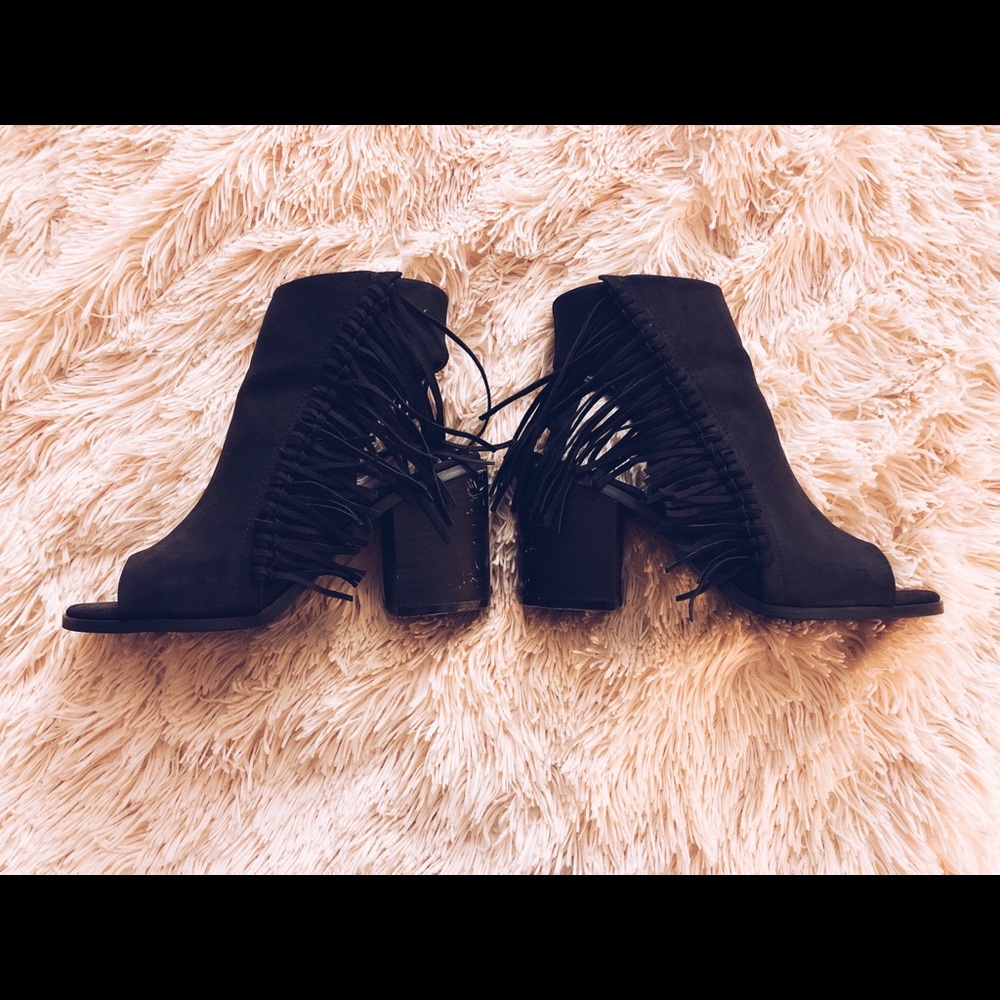 Black fringe open toe and backless heeled booties